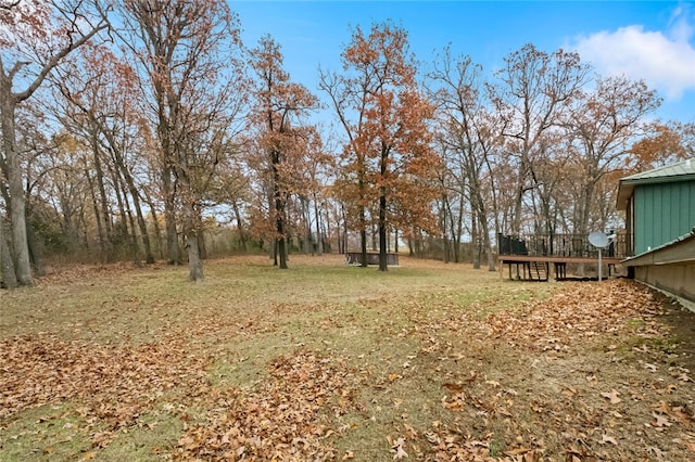 view of yard with a deck