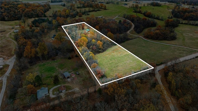 15258 Shipe Rd, Gravette, AR 72736 - aerial view of property and surrounding area featuring property parcel outlined and rural landscape