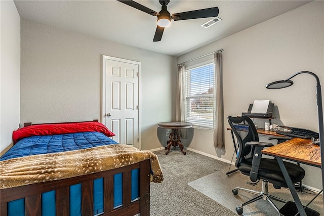 carpeted bedroom with ceiling fan