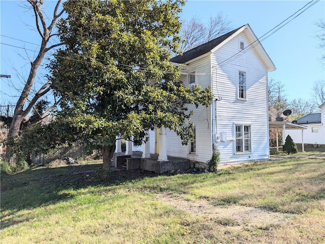 view of home's exterior featuring a lawn