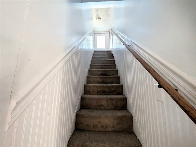 stairway with carpet flooring