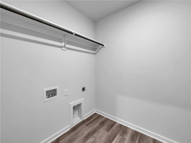 laundry area featuring washer hookup, electric dryer hookup, and dark wood-type flooring