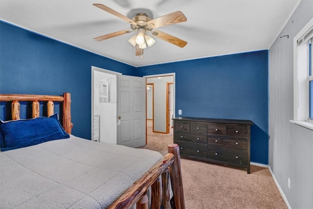 bedroom with ceiling fan and light colored carpet