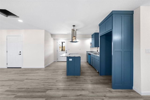 kitchen with sink, hanging light fixtures, stainless steel dishwasher, a kitchen island, and island exhaust hood