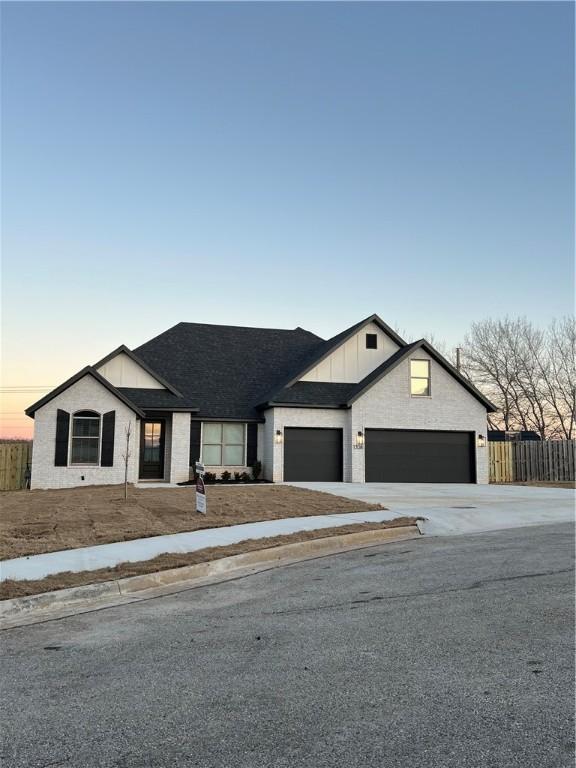 view of front of property featuring a garage