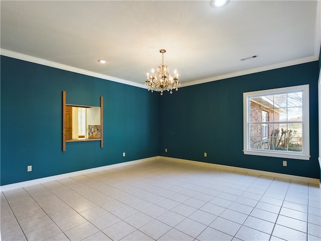 empty room featuring a chandelier, crown molding, and light tile patterned flooring