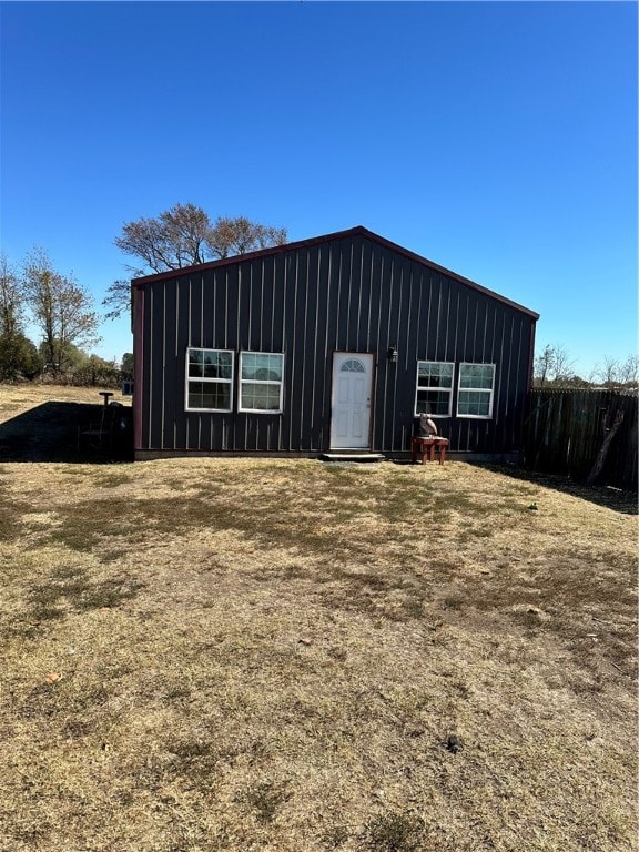 view of outdoor structure with a lawn