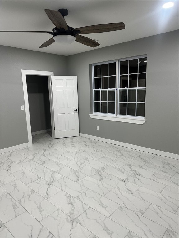 unfurnished bedroom with ceiling fan