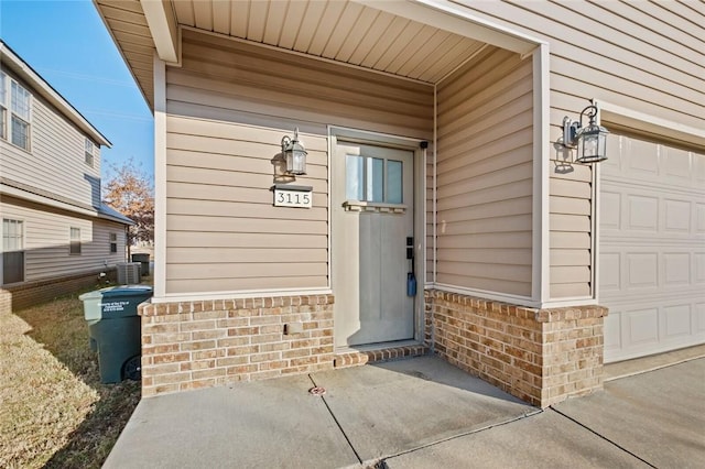 property entrance featuring a garage