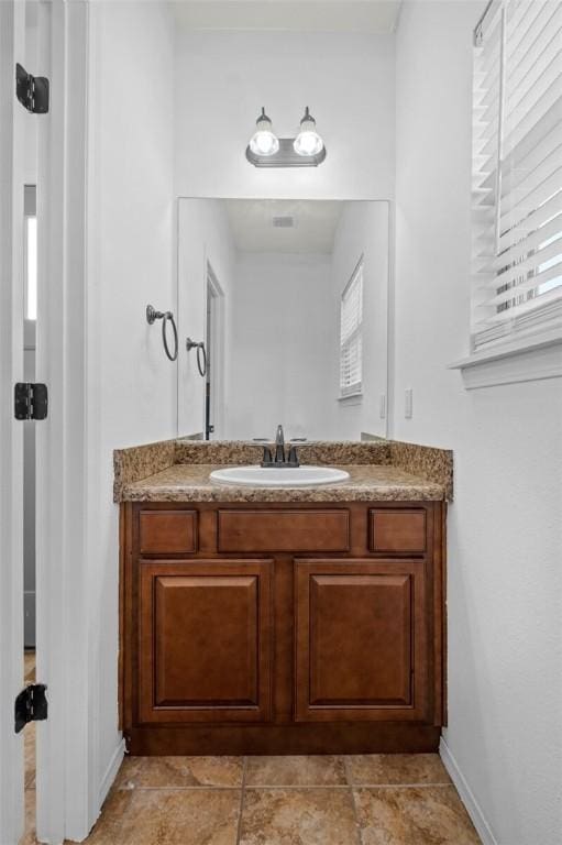 bathroom featuring vanity