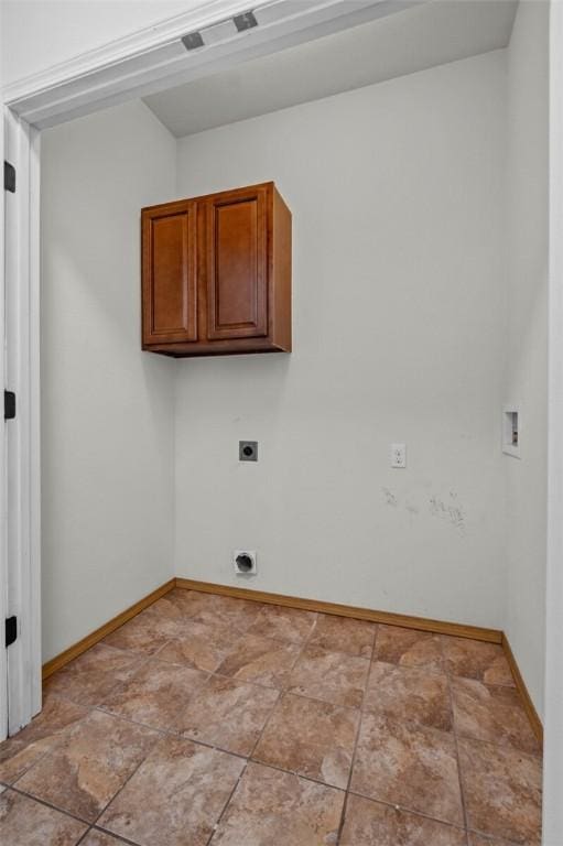 laundry room featuring cabinets, washer hookup, and electric dryer hookup