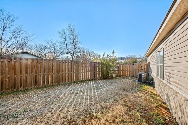 view of yard featuring central AC