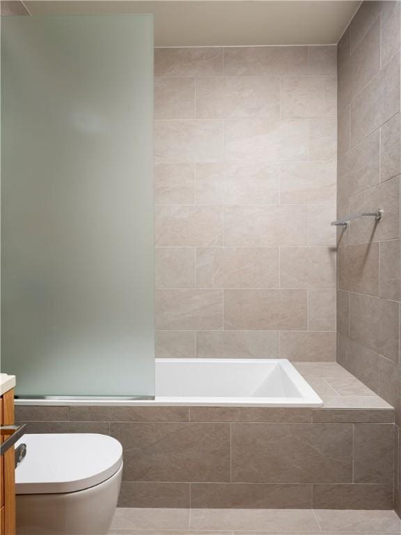 bathroom with tile patterned floors, vanity, toilet, and tile walls