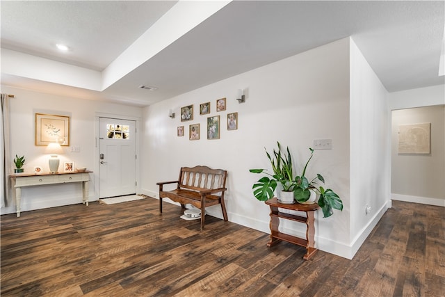 living area with dark wood-type flooring