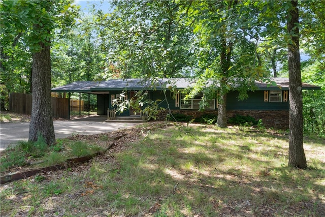 exterior space featuring a carport