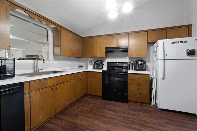 kitchen with black appliances, dark hardwood / wood-style flooring, sink, and vaulted ceiling