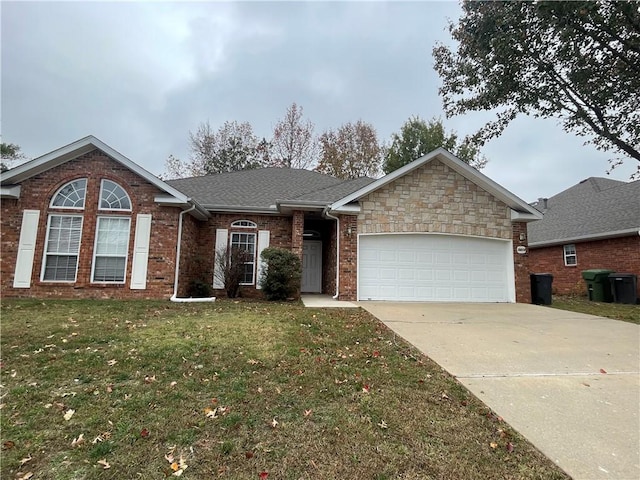 single story home with a garage and a front lawn