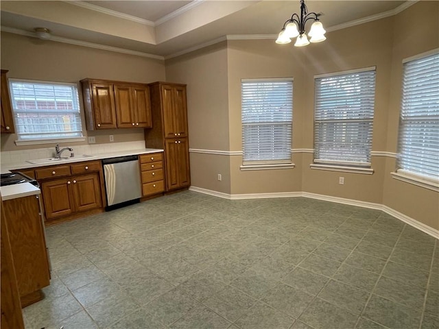 kitchen with dishwasher, a wealth of natural light, sink, and decorative light fixtures