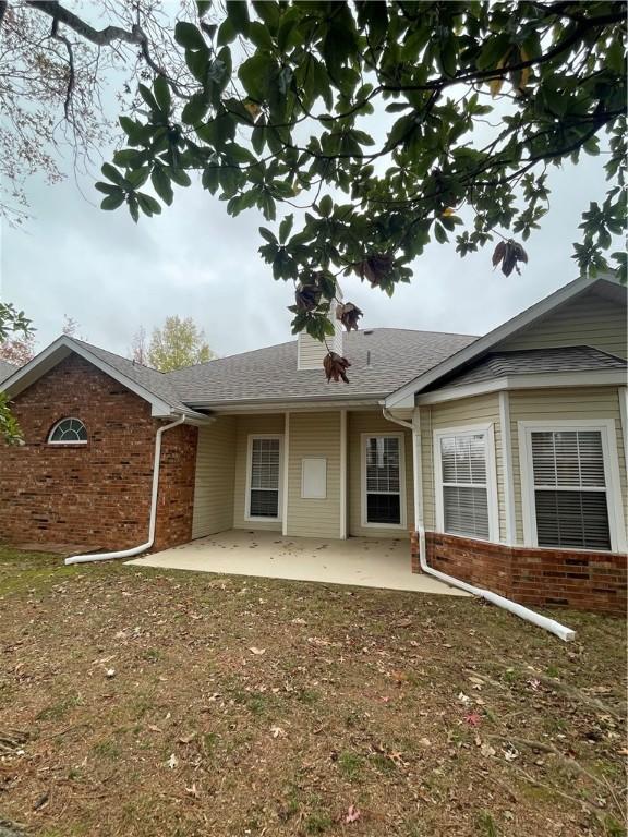 rear view of house featuring a patio area