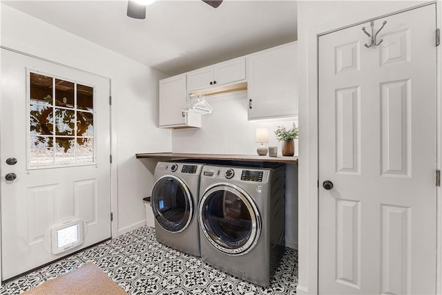 washroom with ceiling fan, cabinets, and washer and clothes dryer