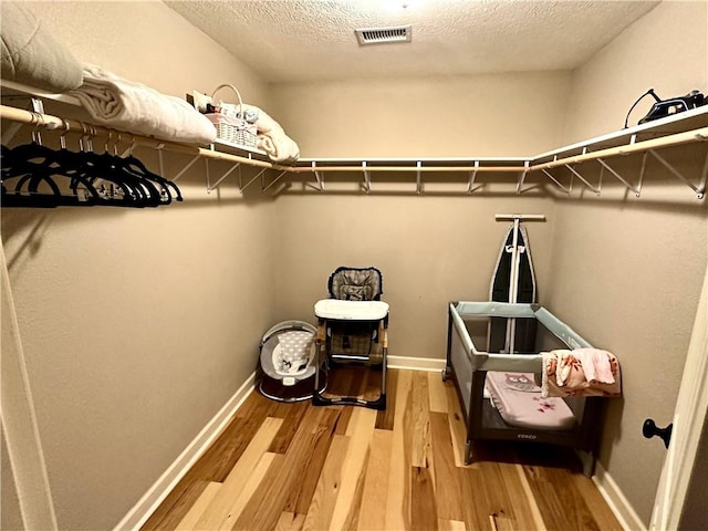 329 Bradley Ridge Rd, Marshall, AR 72650 - walk in closet featuring wood finished floors