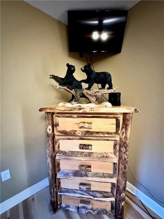 329 Bradley Ridge Rd, Marshall, AR 72650 - detailed view of baseboards and wood finished floors