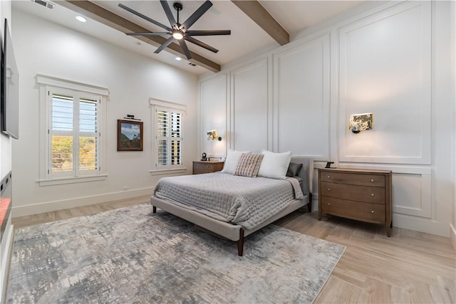 bedroom featuring baseboards, visible vents, beam ceiling, light wood-style flooring, and recessed lighting