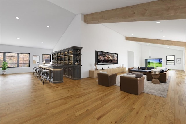 living area with beam ceiling, recessed lighting, high vaulted ceiling, and wood finished floors