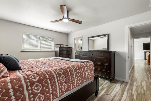 bedroom featuring ceiling fan and light wood-type flooring