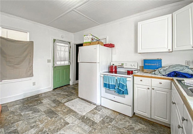kitchen featuring white cabinets, white appliances, ornamental molding, and tile countertops