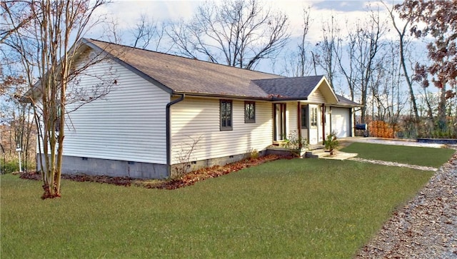 ranch-style house with a front yard, roof with shingles, a garage, crawl space, and driveway