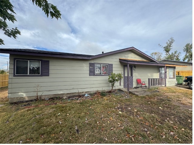 single story home featuring a patio area and a front yard