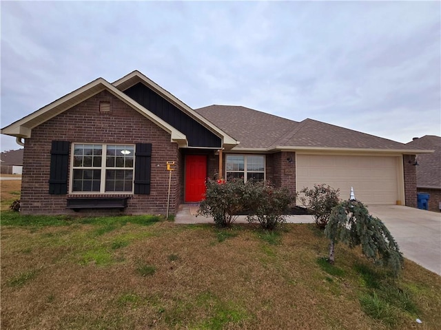 ranch-style house featuring a garage and a front yard