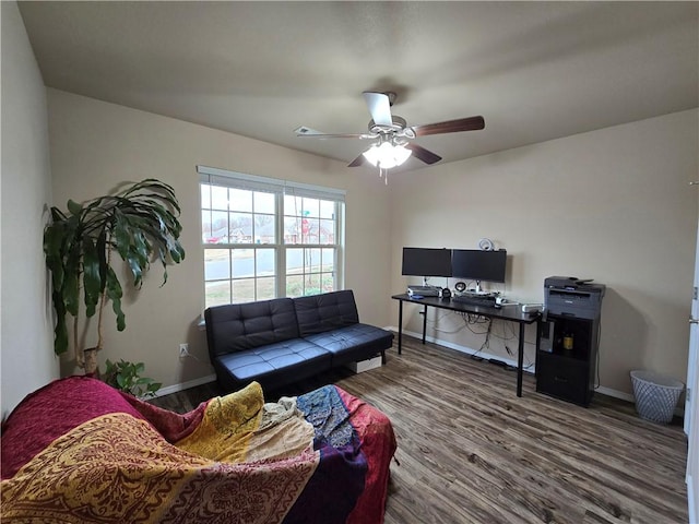 living room with hardwood / wood-style floors and ceiling fan