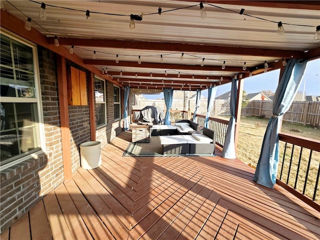 wooden terrace featuring an outdoor hangout area