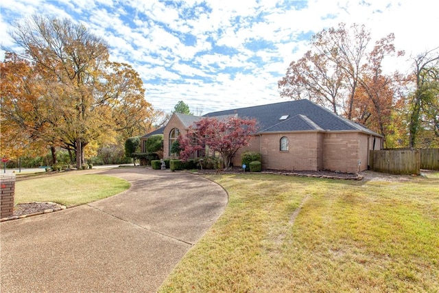 view of front of home with a front lawn