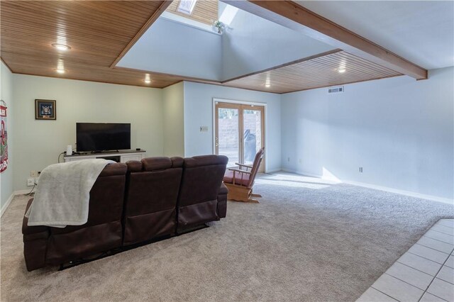 living room with wooden ceiling, light carpet, and a skylight