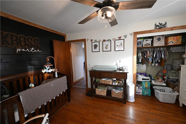 dining room with dark hardwood / wood-style floors and ceiling fan