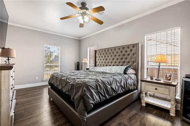 bedroom with crown molding, ceiling fan, and dark wood-type flooring