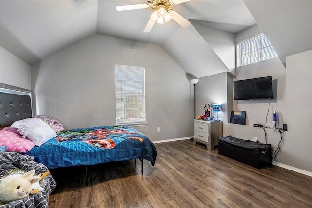 bedroom with ceiling fan, hardwood / wood-style floors, and lofted ceiling