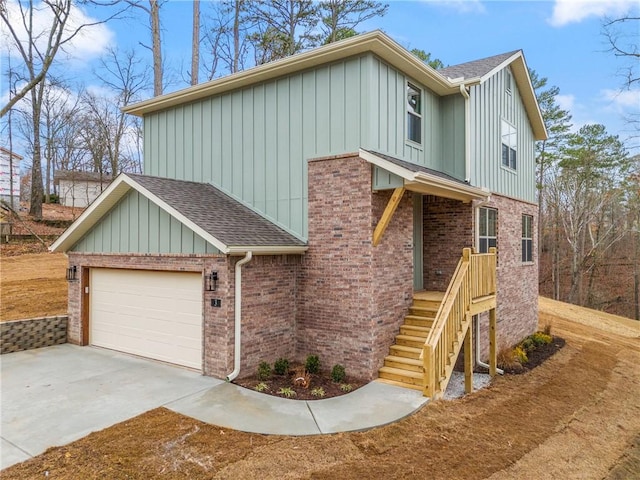 view of front of property with a garage