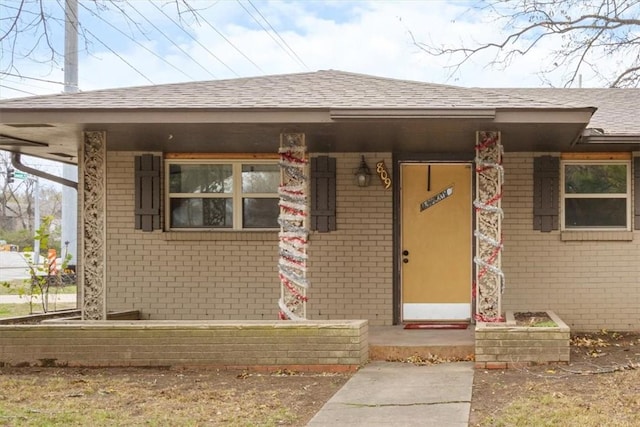 doorway to property featuring a porch