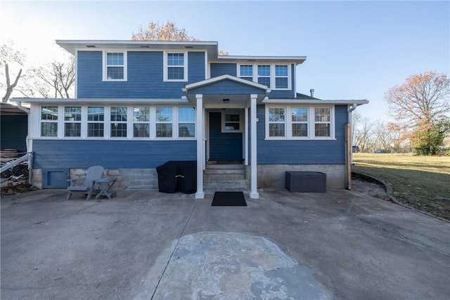 view of front of home featuring a patio