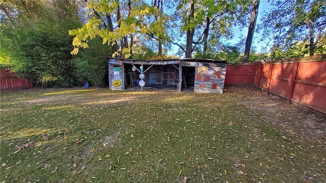 view of outbuilding with a lawn