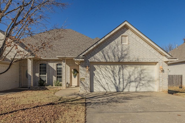 view of front of home with a garage