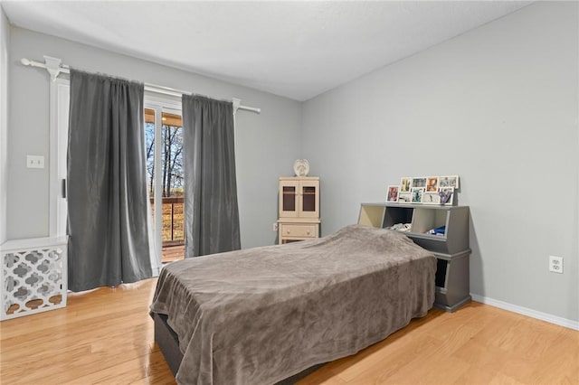 bedroom featuring hardwood / wood-style floors