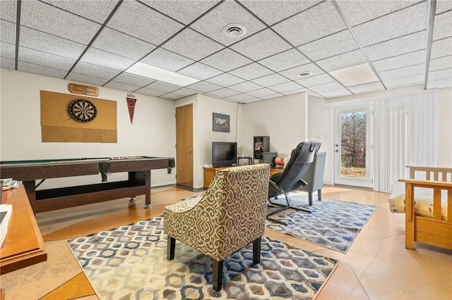 interior space with a paneled ceiling and billiards