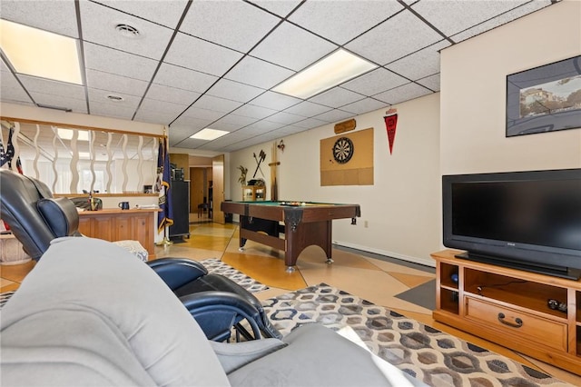 recreation room with a paneled ceiling, light tile patterned floors, and billiards