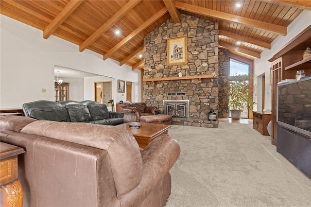 carpeted living room with beamed ceiling, high vaulted ceiling, a stone fireplace, and wood ceiling