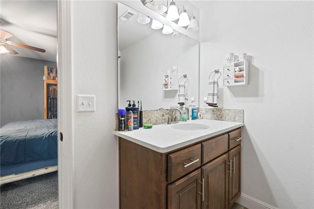 bathroom featuring vanity and ceiling fan